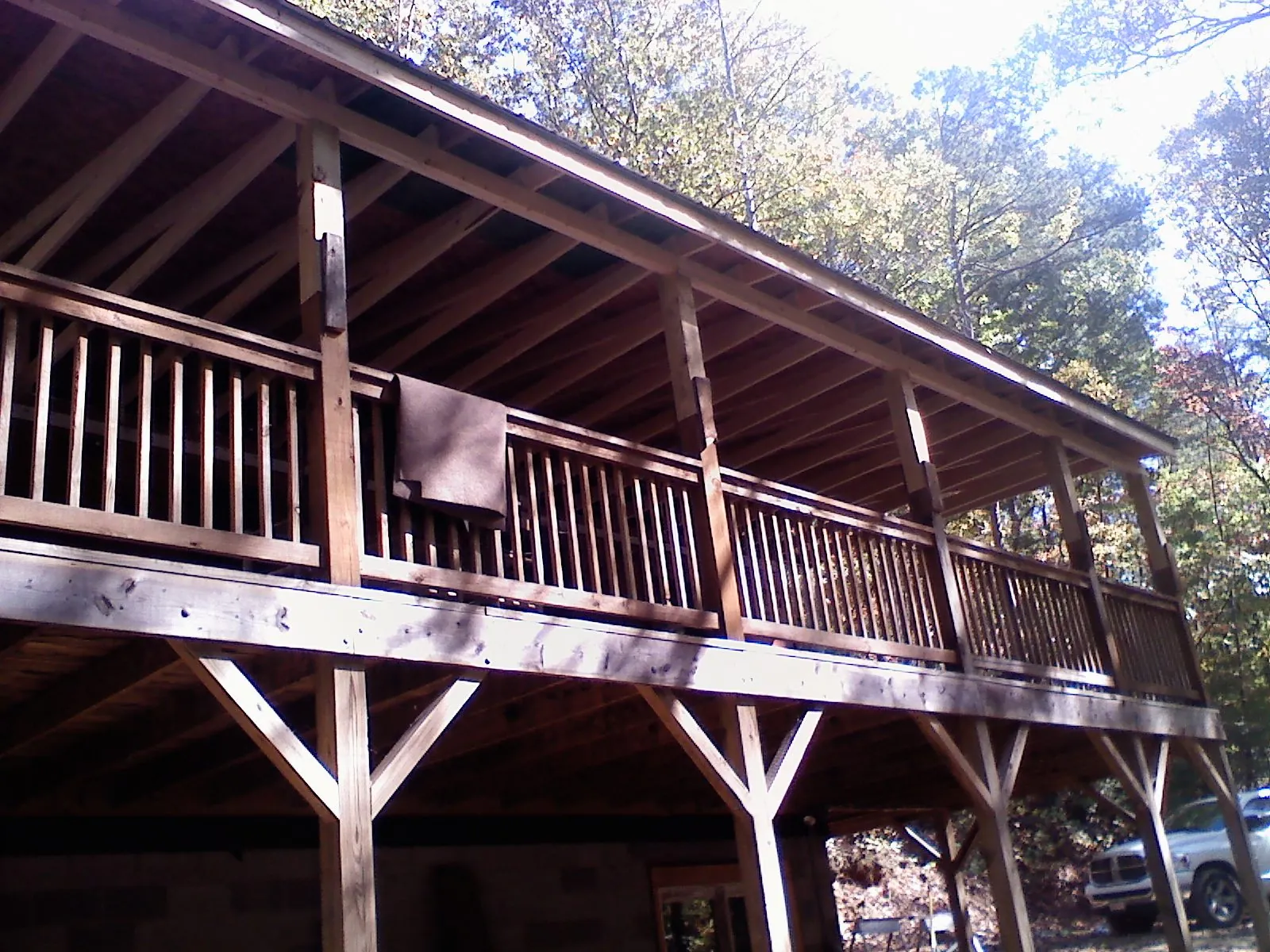 Timber framing under a new elevated porch and deck — Roof Leak Repair in Bountiful by Roofing Brothers